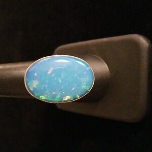 Large Oval Blue Faux Opal Triplet Ring in Simple Setting